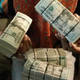 Tony Harris posted to his Facebook page Oct. 5, 2015, a photo of his wife holding stacks of cash. A week later, Harris was dead.
Twitter